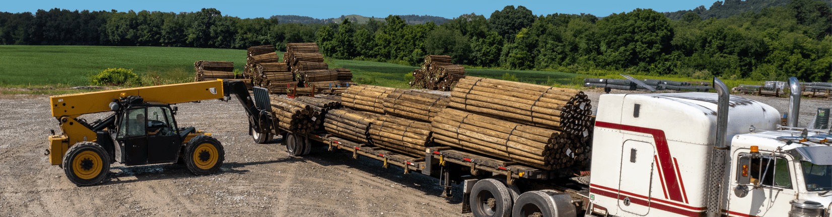 Posts being unloaded from a truck at the Kencove Pennsylvania location parking lot
